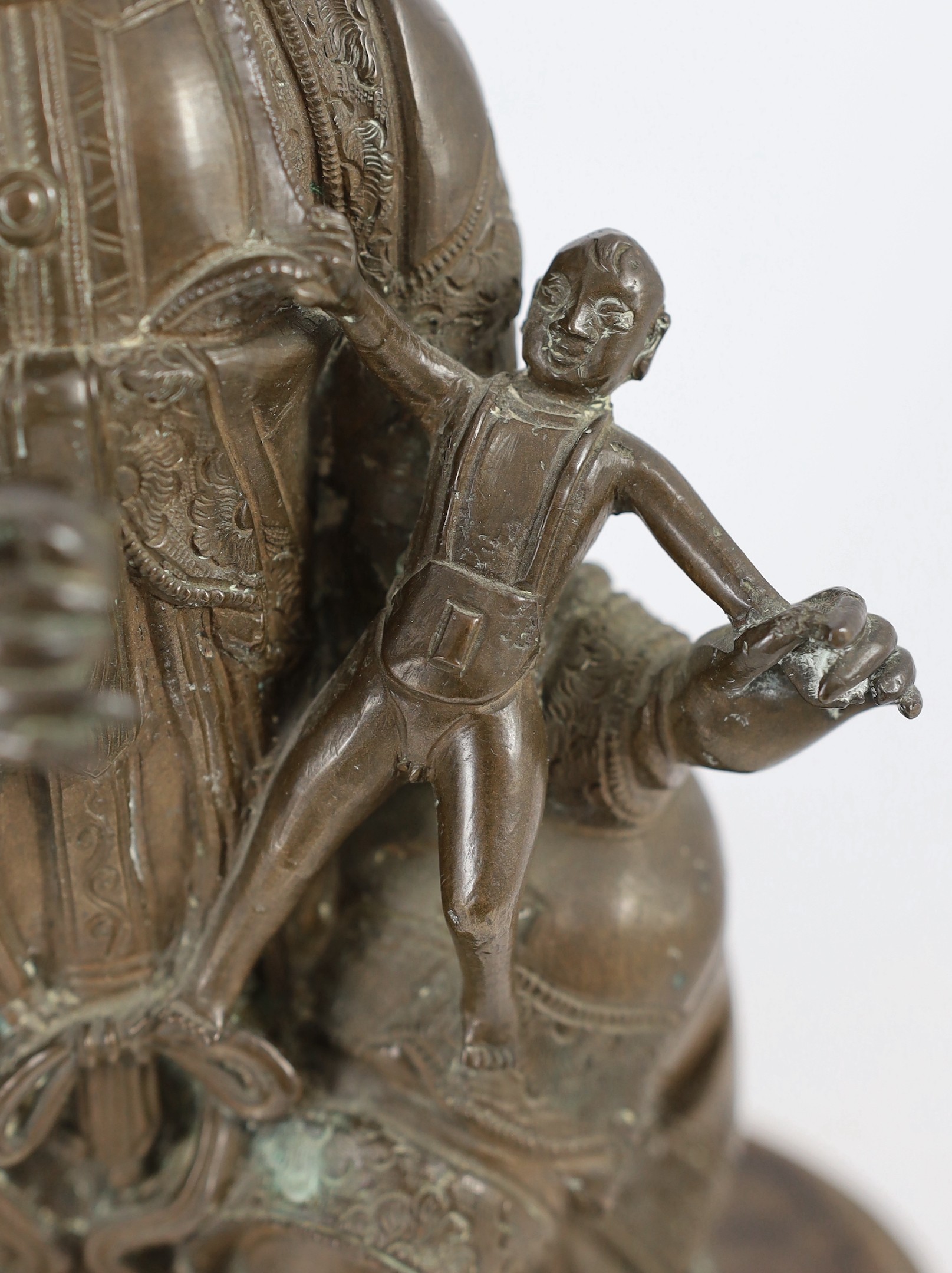 A large Chinese bronze group of Xi Wangmu and a child, late Ming dynasty, 31.5cm high excluding later wood stand